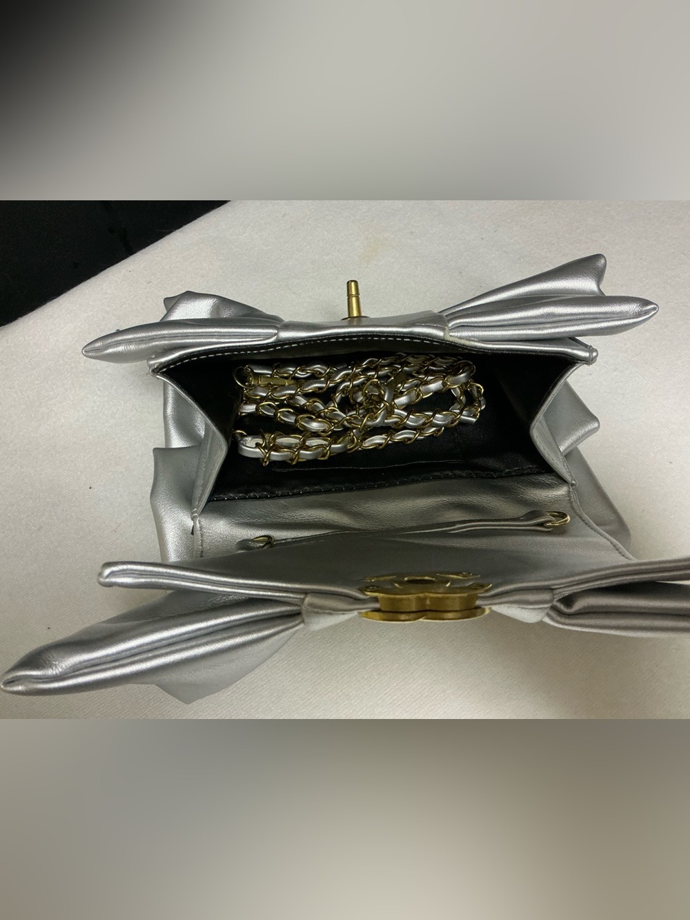 Silver Satin Bow Clutch with Gold Emblem - Picture 8 of 8